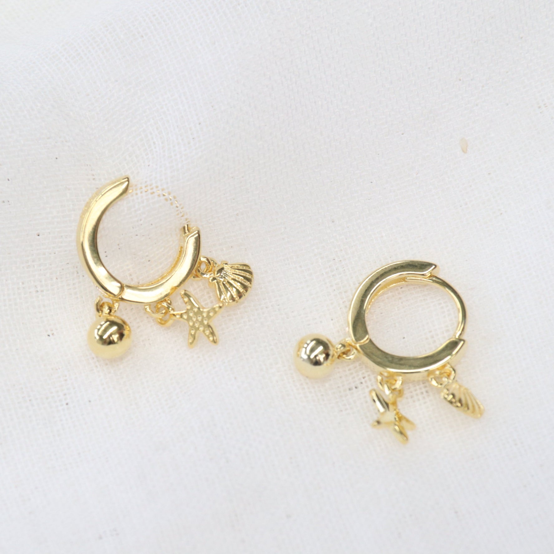 Kri | Gold Plated & Sterling Silver Shell Star Fish Huggie Earrings
